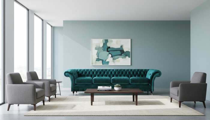 Elegante divano imbottito Chesterfield verde moderno a quattro posti. Divano in tessuto.