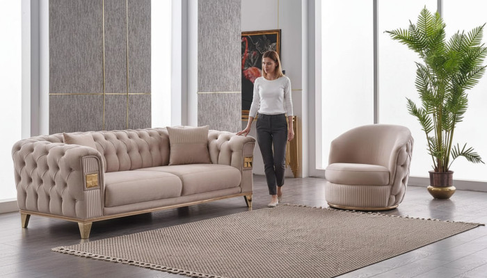 Poltrona design beige Chesterfield per soggiorno mobili imbottiti lusso