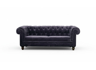 Sofà Chesterfield di design di alta classe imbottito in tessuto di velluto.
