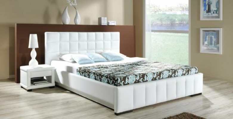 Un lussuoso letto di design in uno stile contemporaneo sofisticato di altissima qualità.